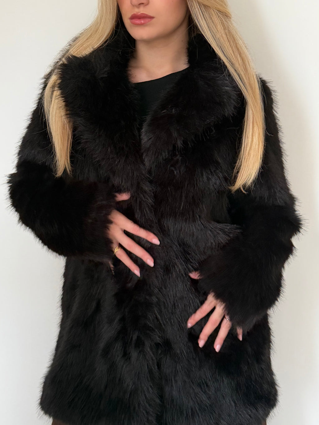 Manteau effet fourrure noir