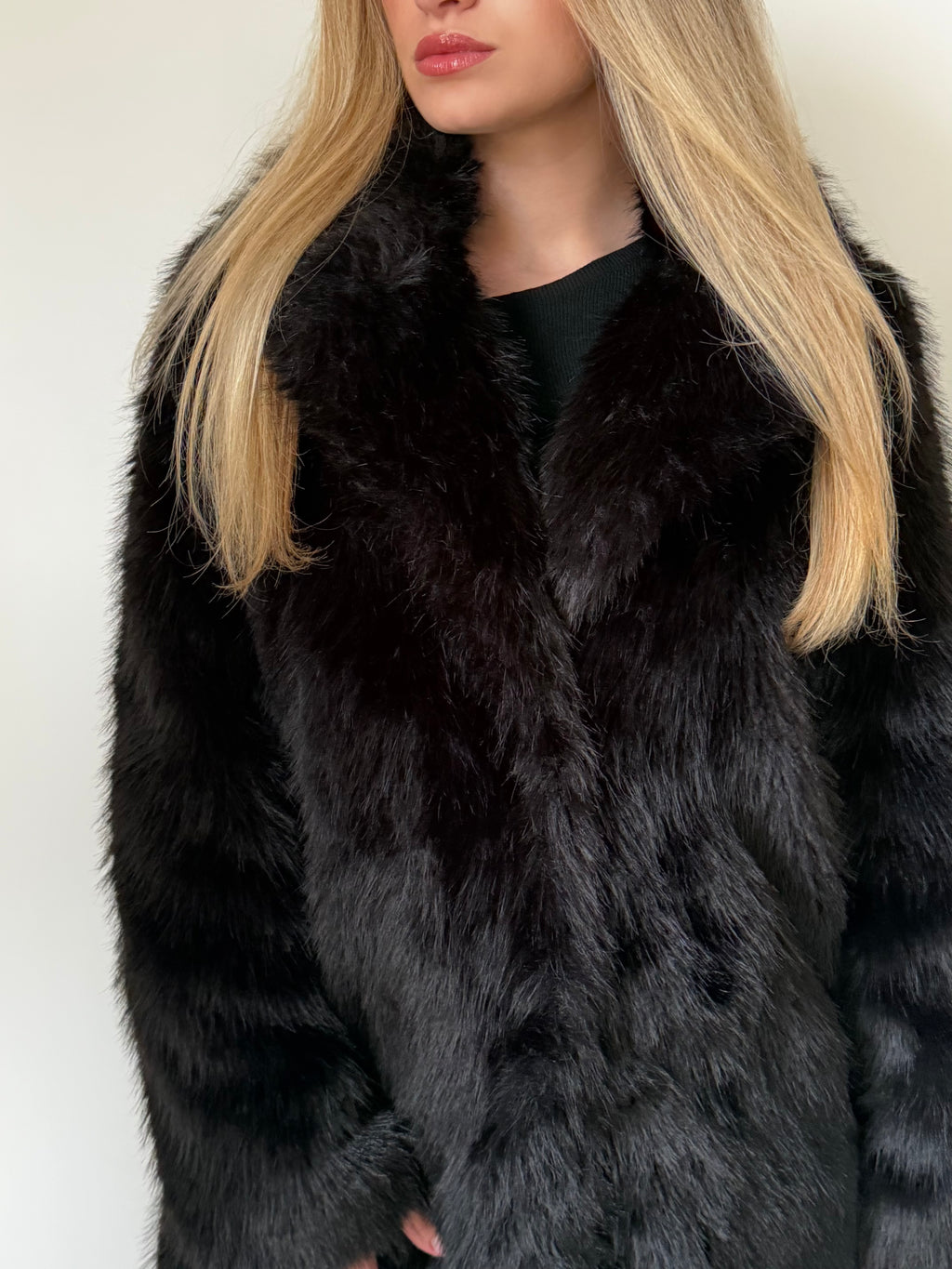 Manteau effet fourrure noir