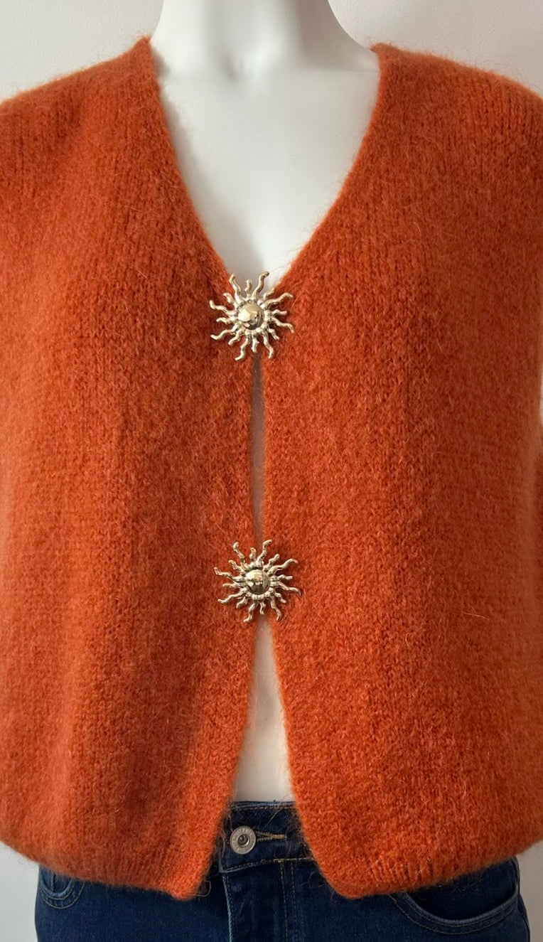 Gilet sans manches avec broches