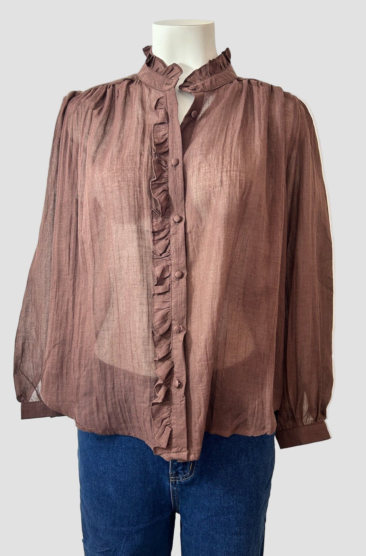 Chemise transparente à volants