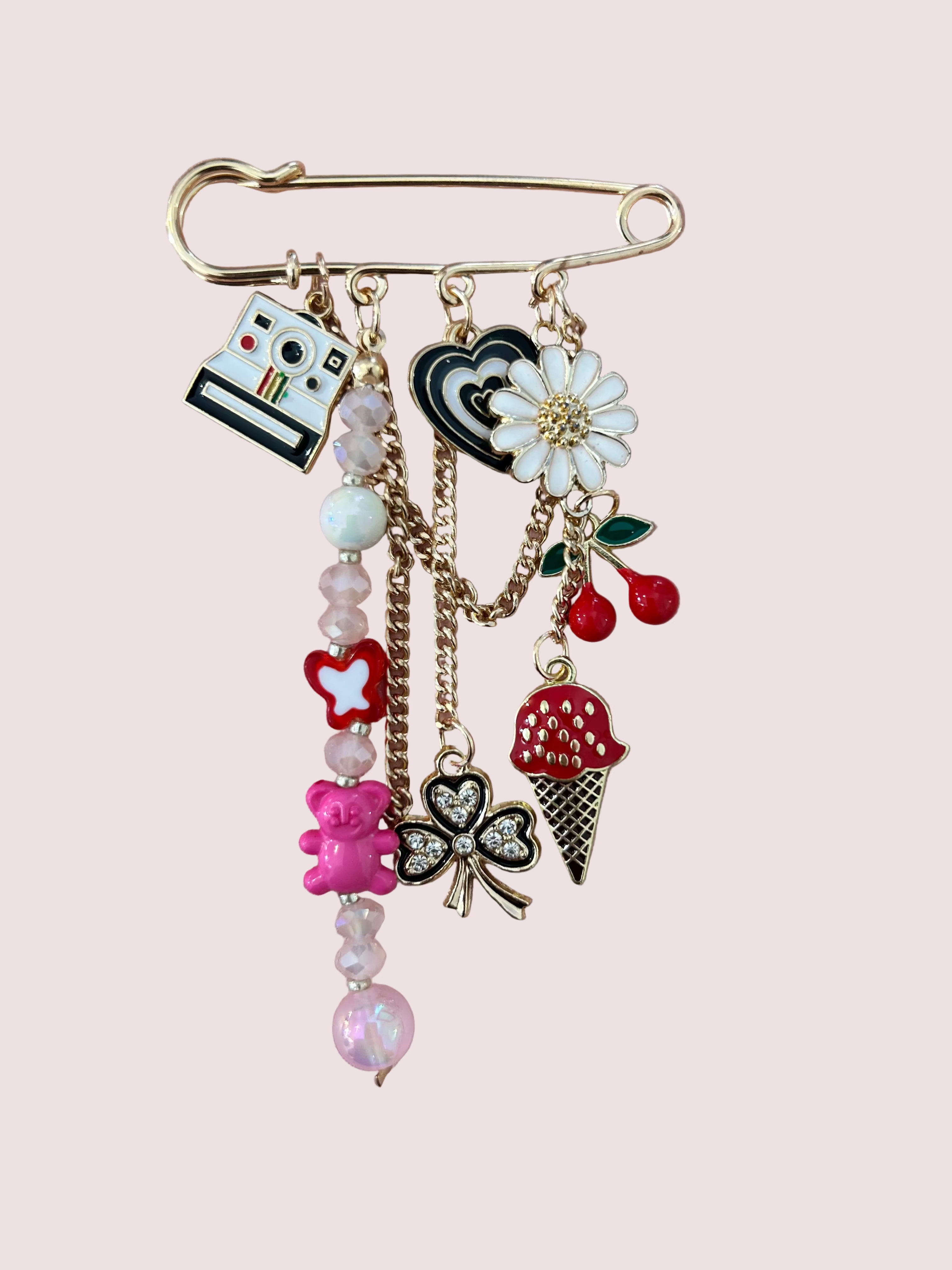 Broche breloques