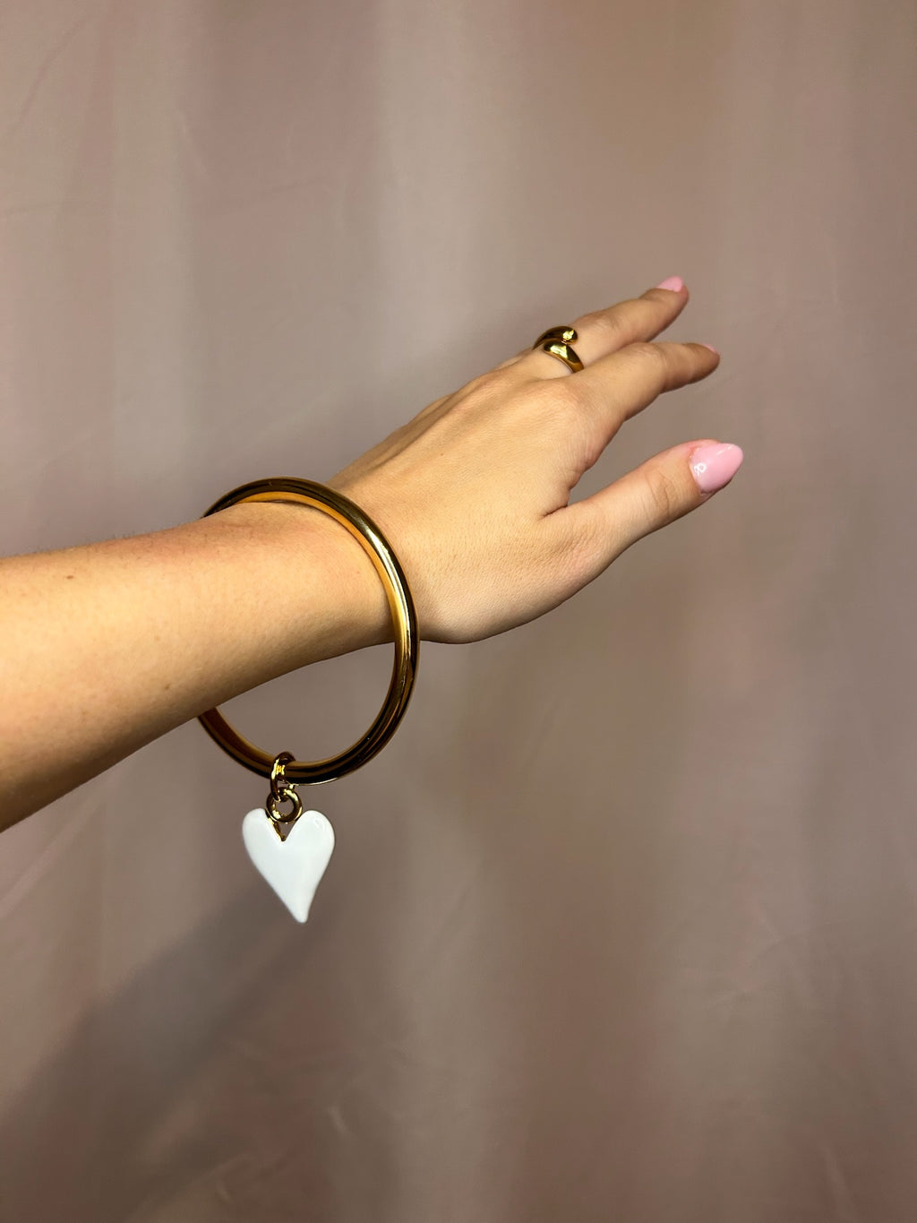 Jonc doré avec breloque coeur