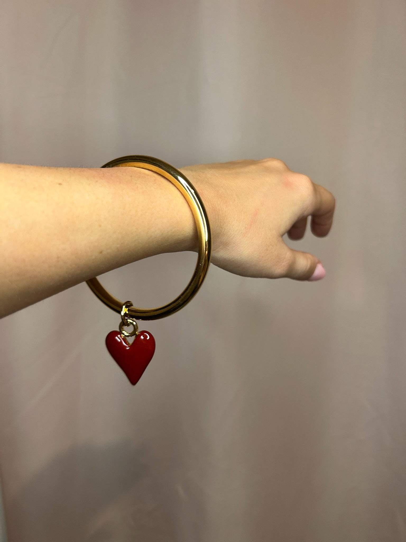 Jonc doré avec breloque coeur