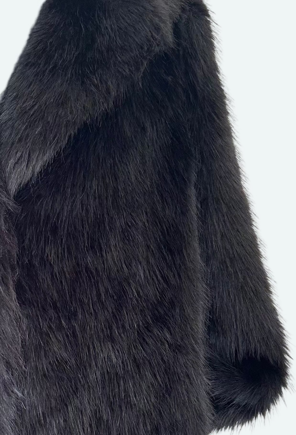 Manteau effet fourrure noir