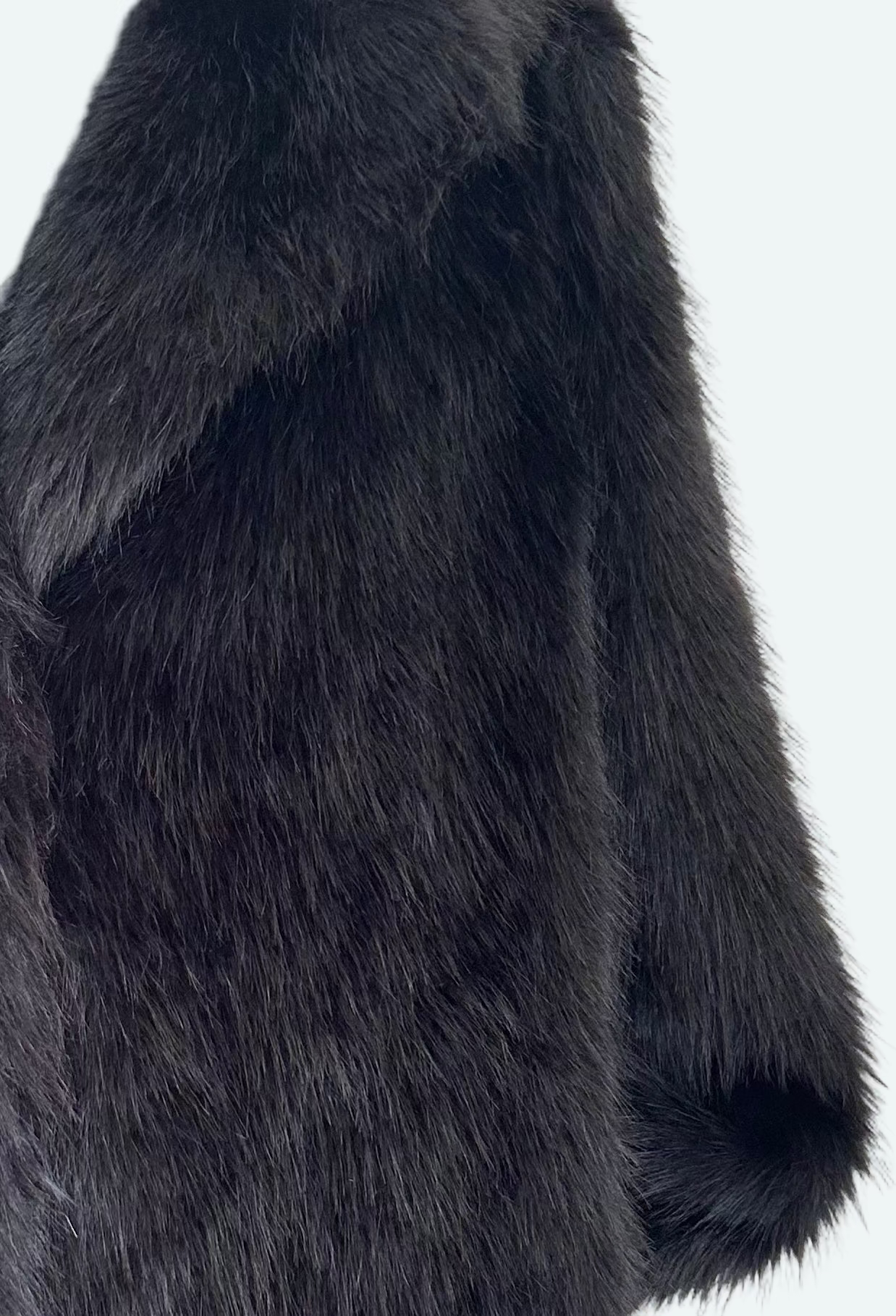 Manteau effet fourrure noir