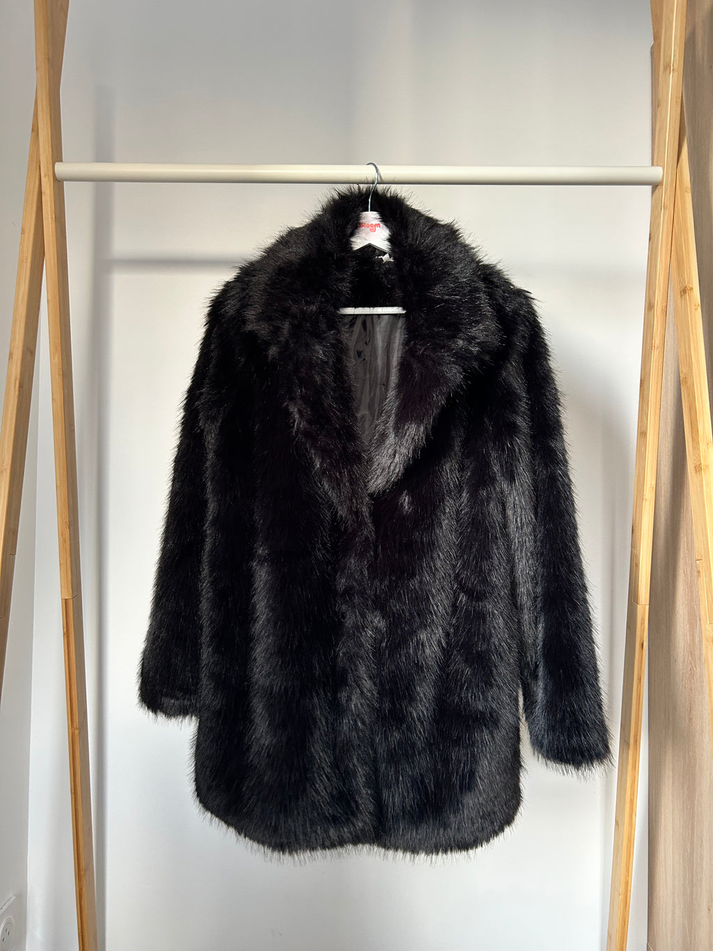 Manteau effet fourrure noir